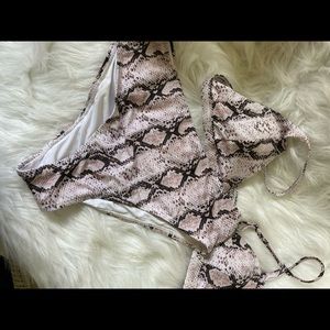 Swim suit Animal print 2 pieces.  Nee but no tags. Size Medium